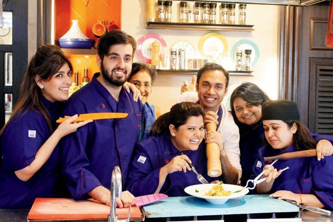 Saransh Goila with students at Palate Culinary Studio