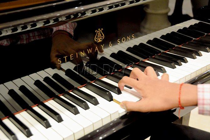 A representative pic of a Steinway grand piano, with the middle C key held down. The Mehli Mehta Foundation has donated this key the first that a child learns which costs Rs 1.4 lakh in the 88 Keys Programme