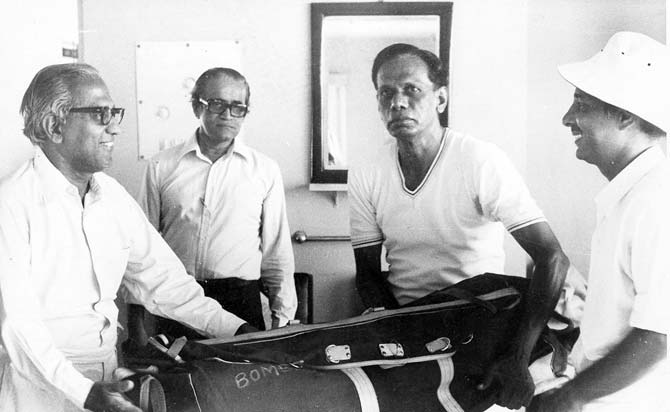 Sports journalists R Sriman (left), Eddie Fernandes, ATP Sarathy and Sunder Rajan (right) with a cricket kit bag during a JK Bose Trophy tournament in the 1970s