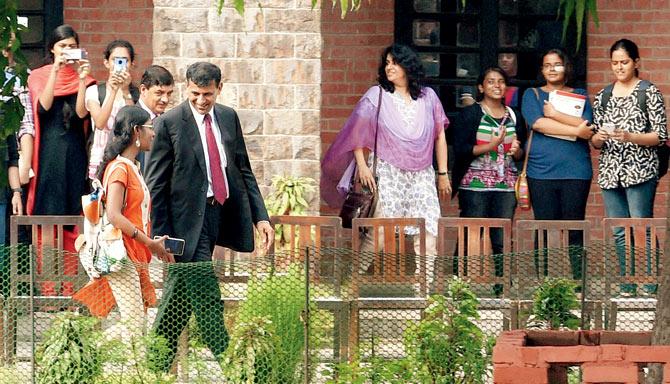 RBI governor Raghuram Rajan leaves after addressing the students of St Stephen’s College in New Delhi on Saturday. Pic/PTI