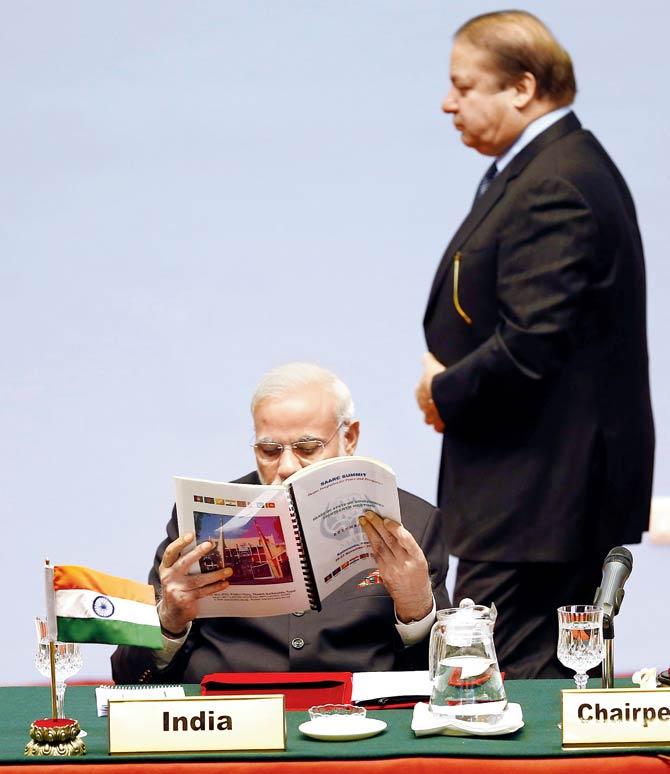 India’s Prime Minister Narendra Modi and his Pakistan counterpart Nawaz Sharif during the 18th SAARC Summit in 2014. Pic/AFP