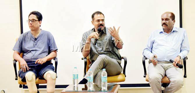 (From left) Activist Samir Zaveri and Maharashtra special IG of police (law and order) Prabhat Kumar and retired ACP Vasant Dhoble at the seminar on Wednesday evening. Pic/Shadab Khan