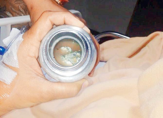 Tin foil in a jar of soup that was served to Anoll Merchant’s wife last year