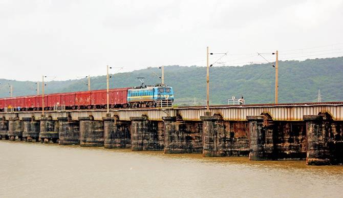 Trains plying on the bridges over Vaitarna river are forced to slow down because of fears of derailment. File pic