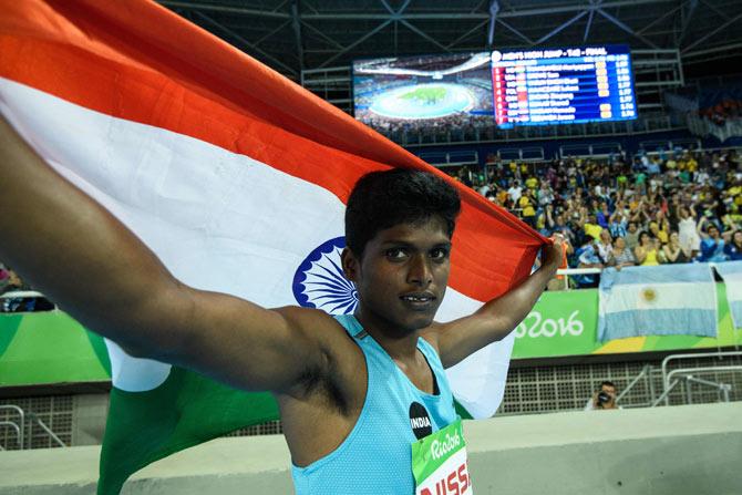 Mariyappan Thangavelu poses after winning the gold medal