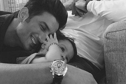 This photo of Sushant Singh Rajput with Dhoni's daughter Ziva is adorable!