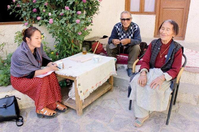 Lobsang Wangmu of Flowering Dharma, with husband-wife duo, Phuntsok Namgyal and Dolma at their new residence 