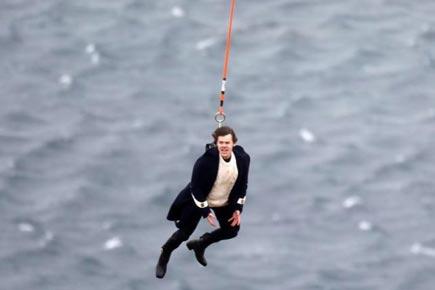 Harry Styles hangs from a helicopter for 'Sign of the Times' music video