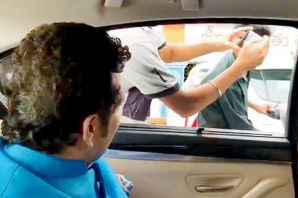 Watch video: Sachin Tendulkar gives on-road helmet lessons
