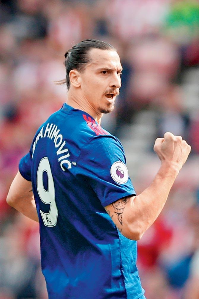 Manchester United forward Zlatan Ibrahimovic celebrates his goal against Sunderland during an English Premier League tie at the Stadium of Light in Sunderland yesterday. Man Utd won 3-0. Pic/Getty Images 