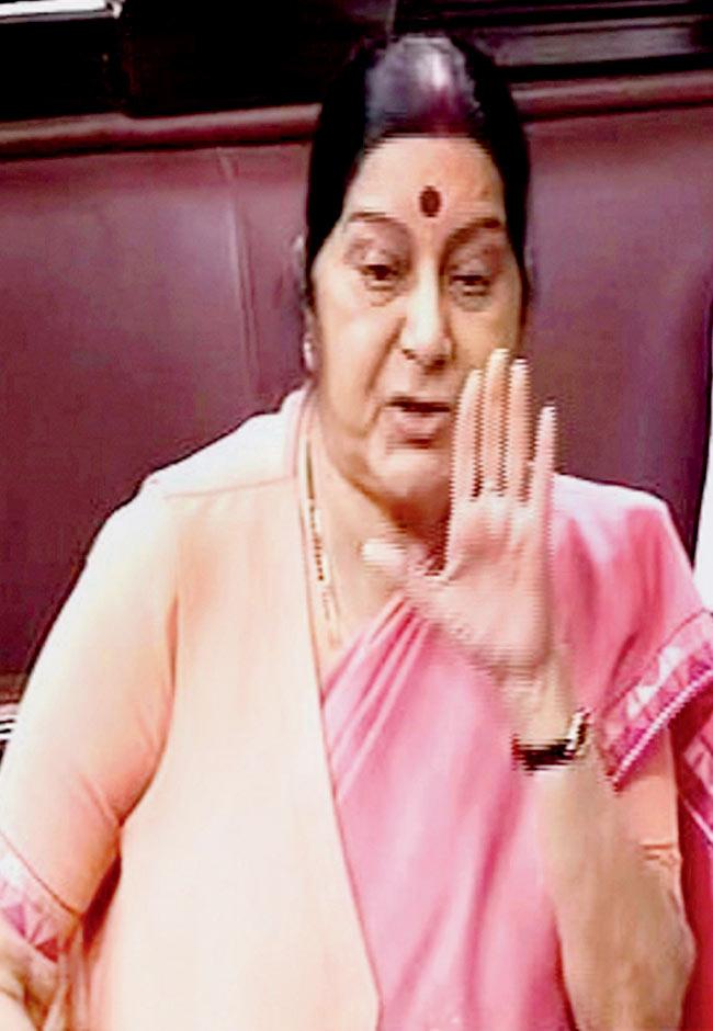 Sushma Swaraj asserted that India will ensure justice to Kulbhushan Jadhav. Pics/PTI