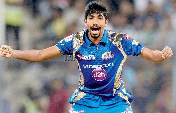 Mumbai Indians pace bowler Jasprit Bumrah celebrates after dismissing