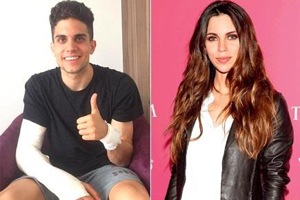 Fiancee Melissa Jimenez stays by Marc Bartra's side during surgery