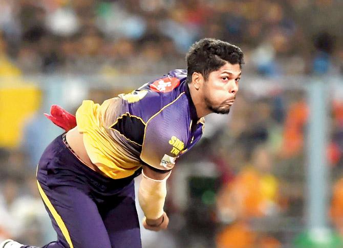 Kolkata Knight Riders’ Umesh Yadav in full cry against Kings XI Punjab at the Eden Gardens yesterday. He claimed four for 33. Pics/AFP
