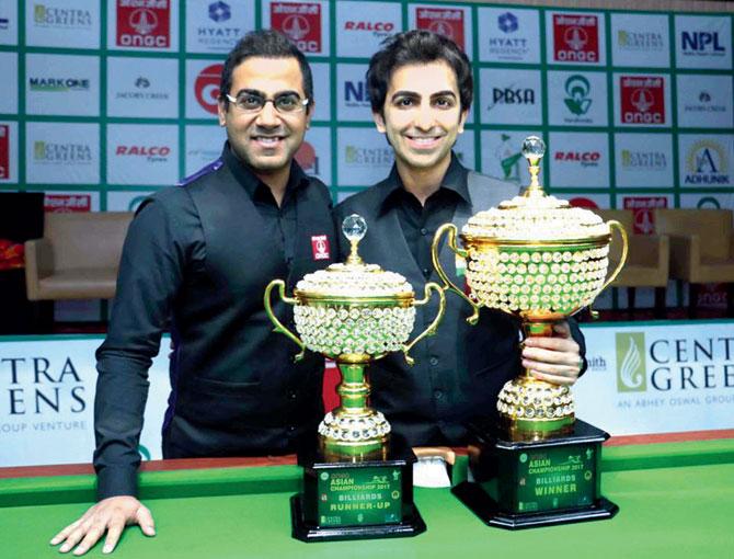 Pankaj Advani (right) with Sourav Kothari after the Asian Billiards win in Chandigarh yesterday