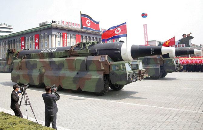 A North Korean KN-08 Intercontinental Ballistic Missile is paraded across Kim Il Sung Square