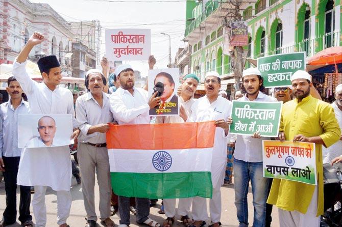 Muslims protest against Pakistan PM Nawaz Sharif for the death sentence given to Kulbhushan Jadhav, in Allahabad, on Friday. pic/PTI