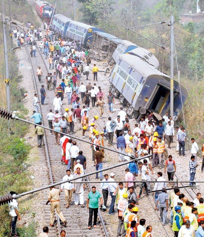 Coaches of the Meerut-Lucknow Rajya Rani Express, which derailed near Rura station, in Rampur, Uttar Pradesh, on Saturday. pic/PTI
