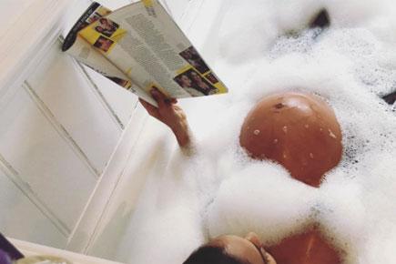 Lisa Haydon poses nude in bathtub, flaunts her baby bump