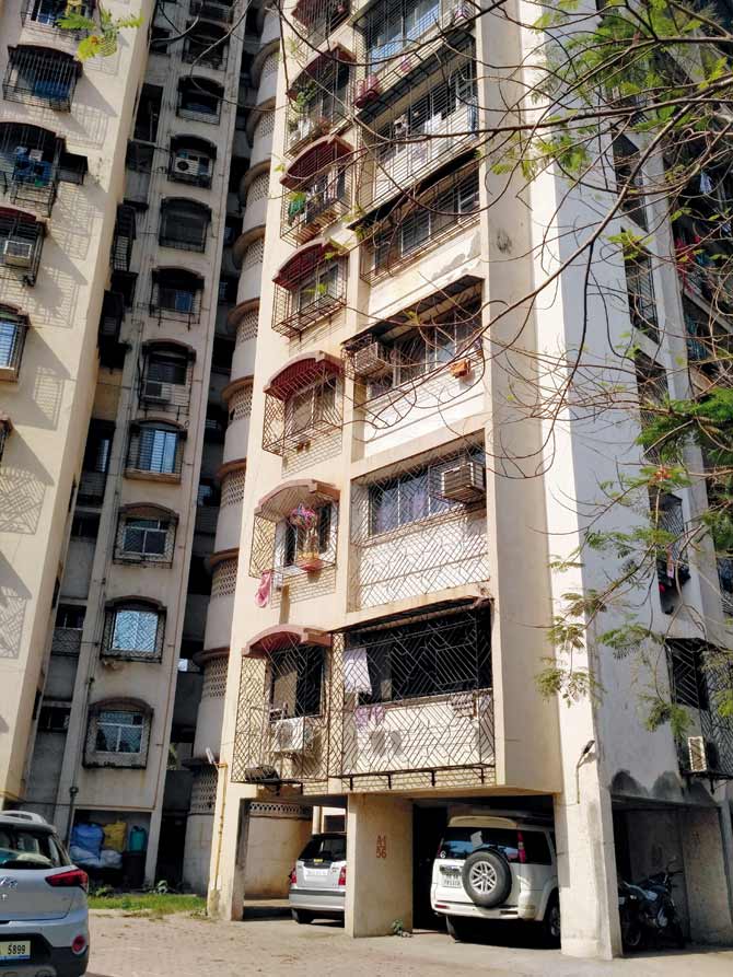 The building in Malwani where they own a 900-sqft flat