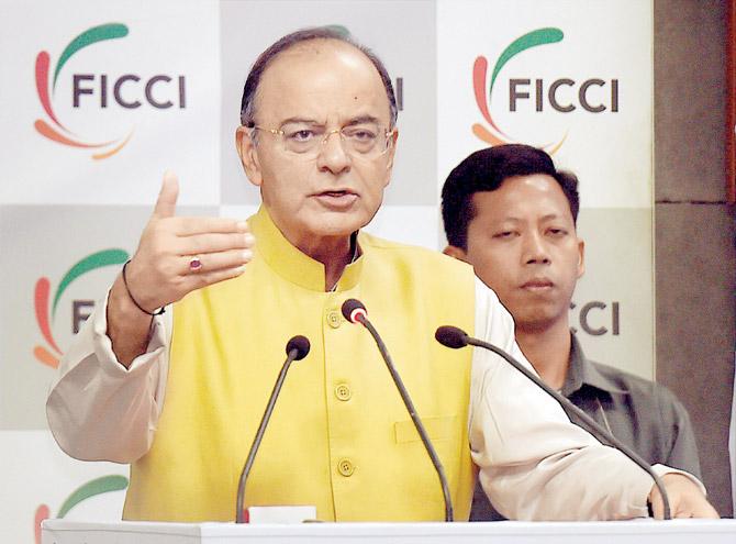 Union Minister for Finance, Corporate Affairs and Defence Arun Jaitley addresses the audience during the 33rd Annual Session of FICCI Ladies Organization (FLO) in New Delhi. Pic/PTI