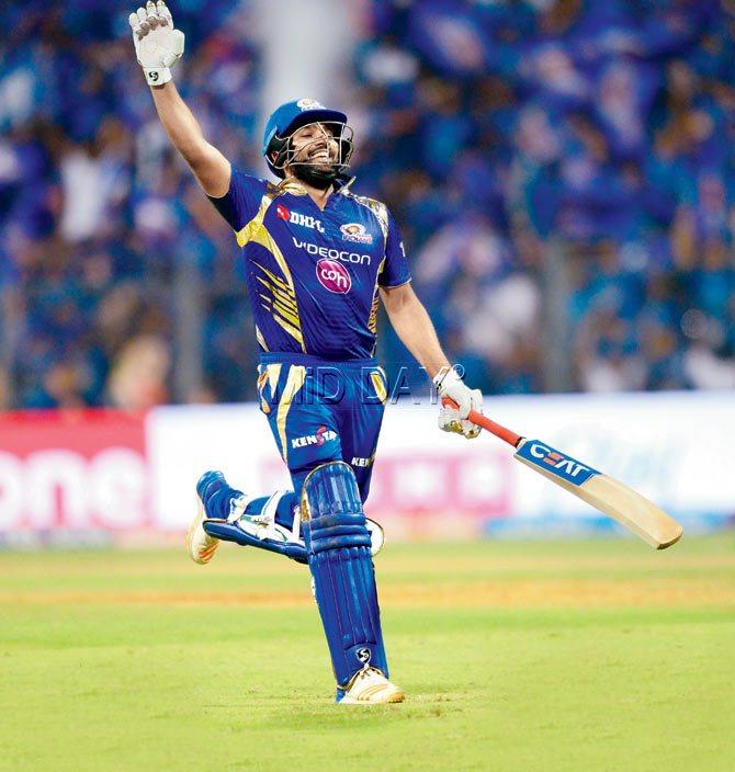 Mumbai Indians captain Rohit Sharma celebrates after beating Gujarat Lions by six wickets in the Indian Premier League at Wankhede Stadium yesterday.  Pic/Suresh Karkera
