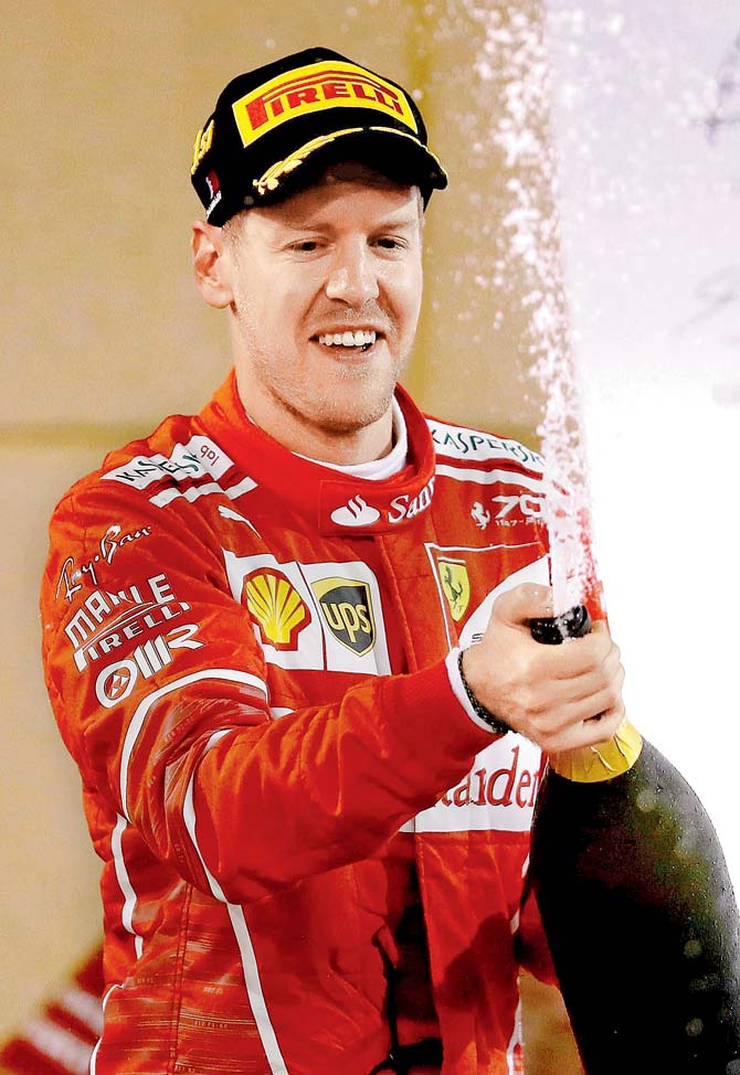 Sebastian Vettel celebrates his Bahrain Grand PrixâÂu00c2u0080Âu00c2u0088win yesterday Pic/Getty Images