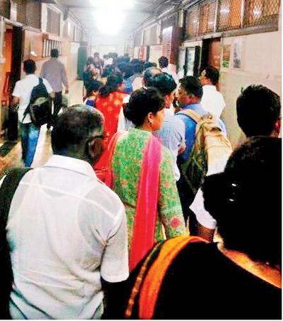 Although staffers turned up on time at Nair hospital, they started work late because of the long queue to sign in through AE-BAS