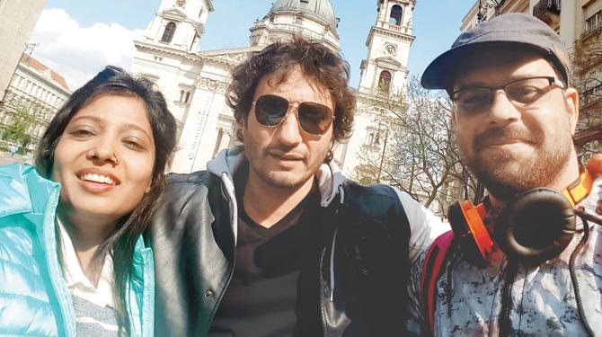 Writer duo Garima-Siddharth with producer Homi Adajania (centre) on the sets