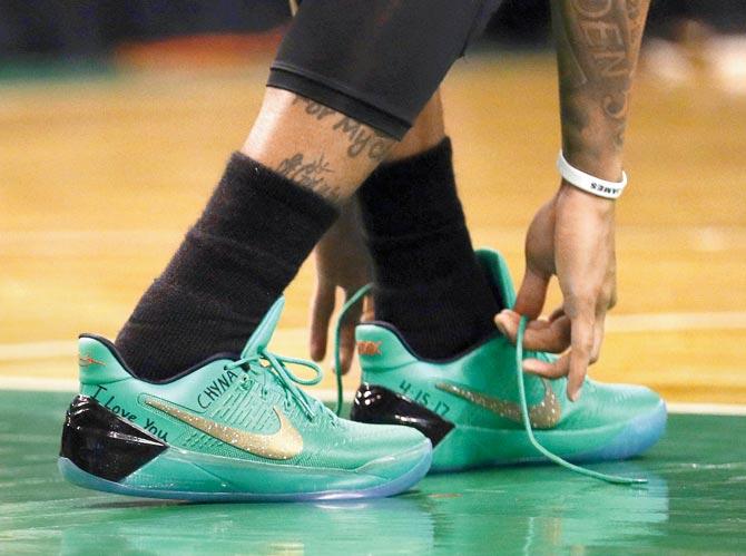 Boston Celtics’ NBA player Isaiah Thomas’ shoes carry the message ‘I Love you Chyna’ dedicated to his late sister, who was killed in a car accident on Saturday. Pic/AFP