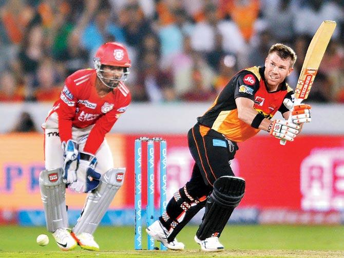 SRH captain David Warner plays it on leg side during his unbeaten 70 against KXIP in Hyderabad on Monday. Pic/AFP