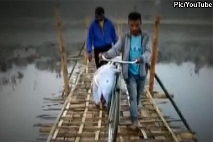 Video of man carrying brother's body on a cycle in Assam goes viral