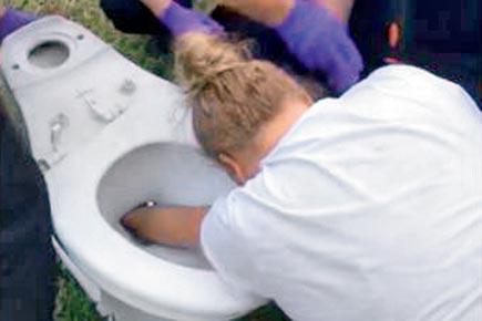 Watch video: Firefighters rescue woman as her hand gets stuck in toilet