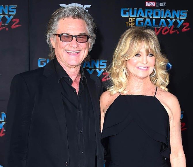 Kurt Russell and actress Goldie Hawn arrive for the world premiere of the film 
