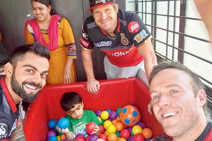 IPL 2017: Virat Kohli and RCB stars bond with specially abled kids