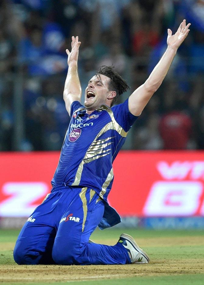  Mumbai Indians’s player Mitchell McClenaghan celebrates the dismissal of Anderson during the IPL match against Delhi Daredevils in Mumbai. Pic/PTI
