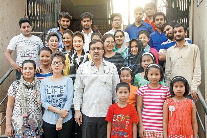 Sanjay Nahar of the Sarhad group with children hailing from conflict-ridden Kashmir and parts of the north-east India. He adopted them a decade ago with the intent of raising the seeds of peace in an inclusive environment. Pic/Madar Tannu