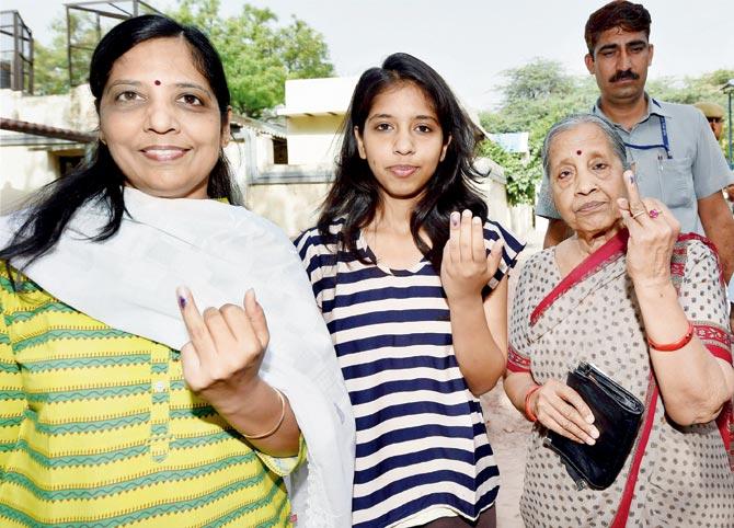 The wife, daughter and mother of Delhi CM vafter casting their votes in New Delhi yesterday. Pic/PTI