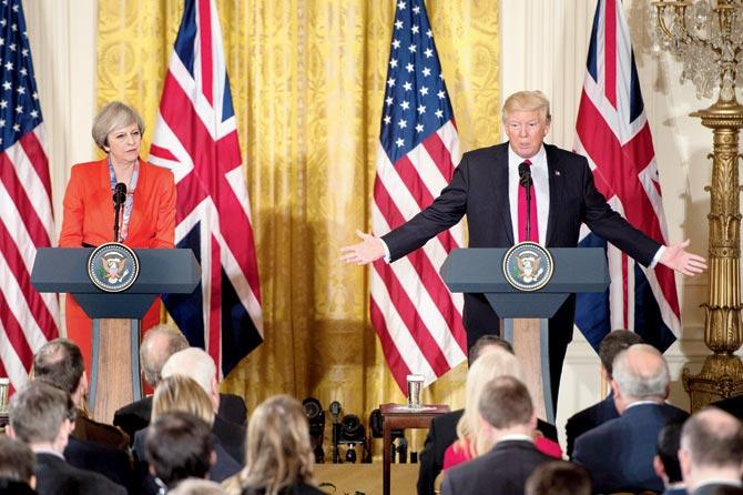 British PM Theresa May with Donald Trump at their January meeting. Pic/AFP