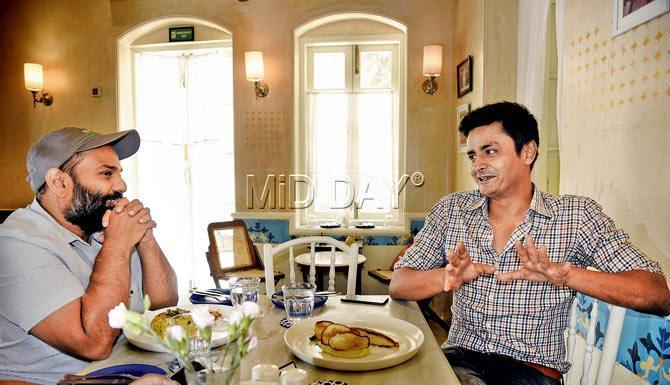 Aditya Raghavan and chef Manu Chandra discuss all things food at Brooke Bond Taj Mahal Tea House in Bandra. Pic/Pradeep Dhivar