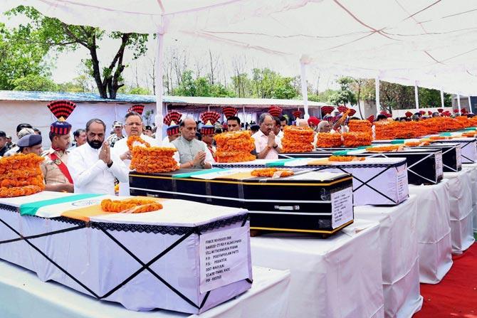 Union Home Minister Rajnath Singh paying tribute to CRPF jawans killed in the naxal attack in Chhattisgarh