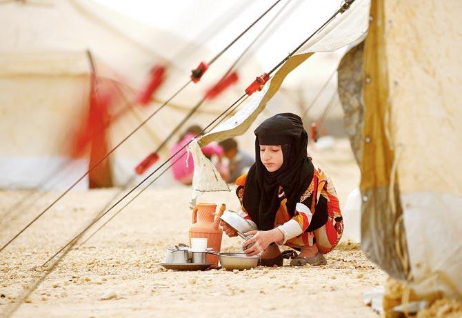 A displaced Syrian girl at the al-Mabrouka camp in the village of Ras al-Ain on the Syria-Turkey border. Pic/AFP