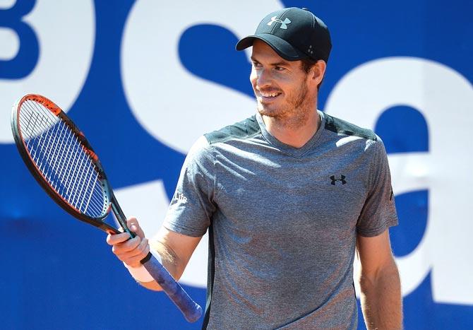 British tennis player Andy Murray smiles during his match against Spanish tennis player Albert Ramos at the ATP Barcelona Open 