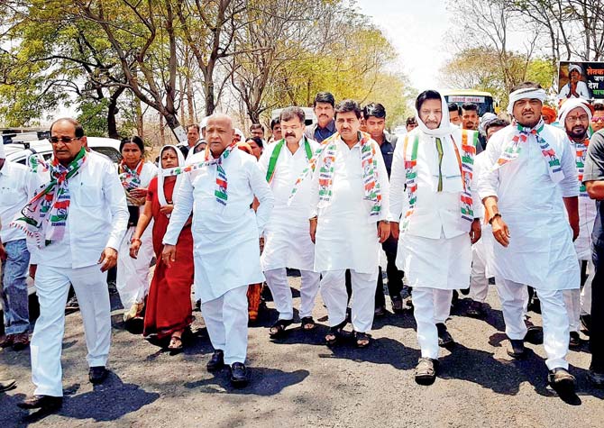Congress and NCP leaders march together in the 