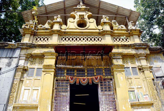 Outside 1902-built Laxmi Narayan Mandir in Ghatkopar East. Her husband belongs to the fourth generation of priests looking after this temple. Pics/Sneha Kharabe