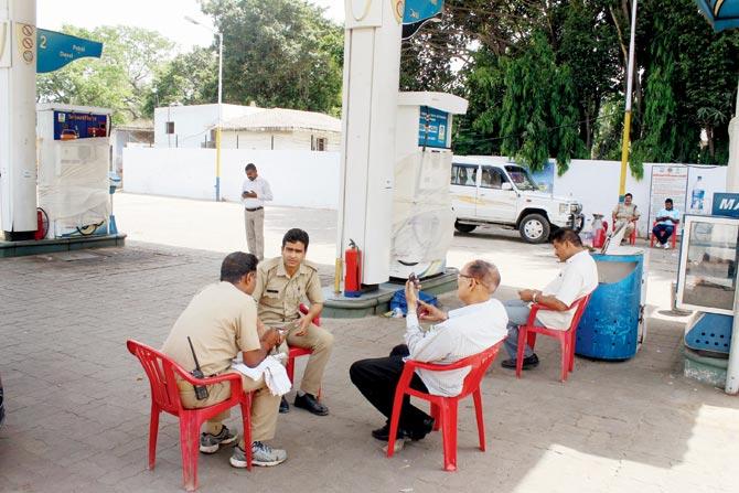 A petrol pump in Lucknow that was sealed after STF officials found an electronic chip here, which was used for fuel theft. Pic/PTI 