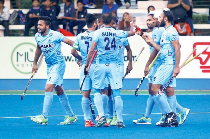 India players celebrate their opening goal against Great Britain at Ipoh, Malaysia on Saturday
