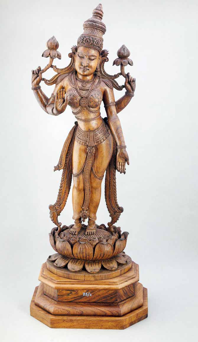 A carved wood figure of Lakshmi from Thiruvananthapuram