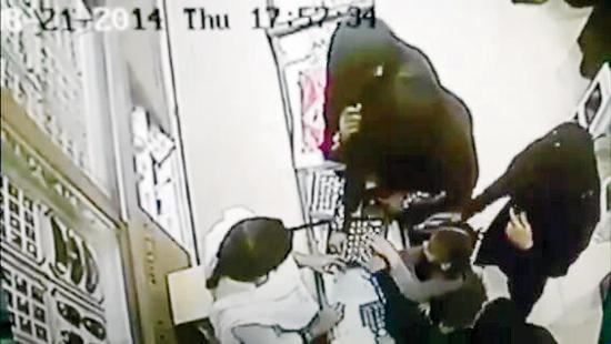 Two of the burqa-clad women seen in a grab from the CCTV footage at the shop