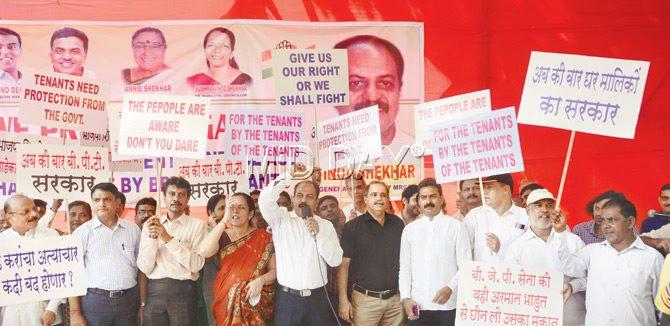 Placards of south Mumbai residents and tenants say it all at Azad Maidan on Tuesday. Pics/Bipin Kokate